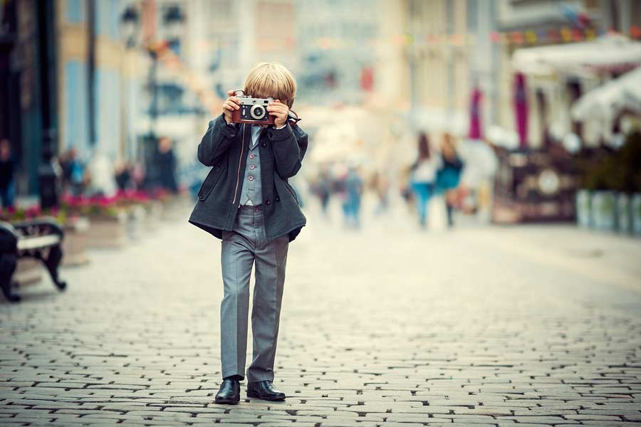 Little Boy With A Camera